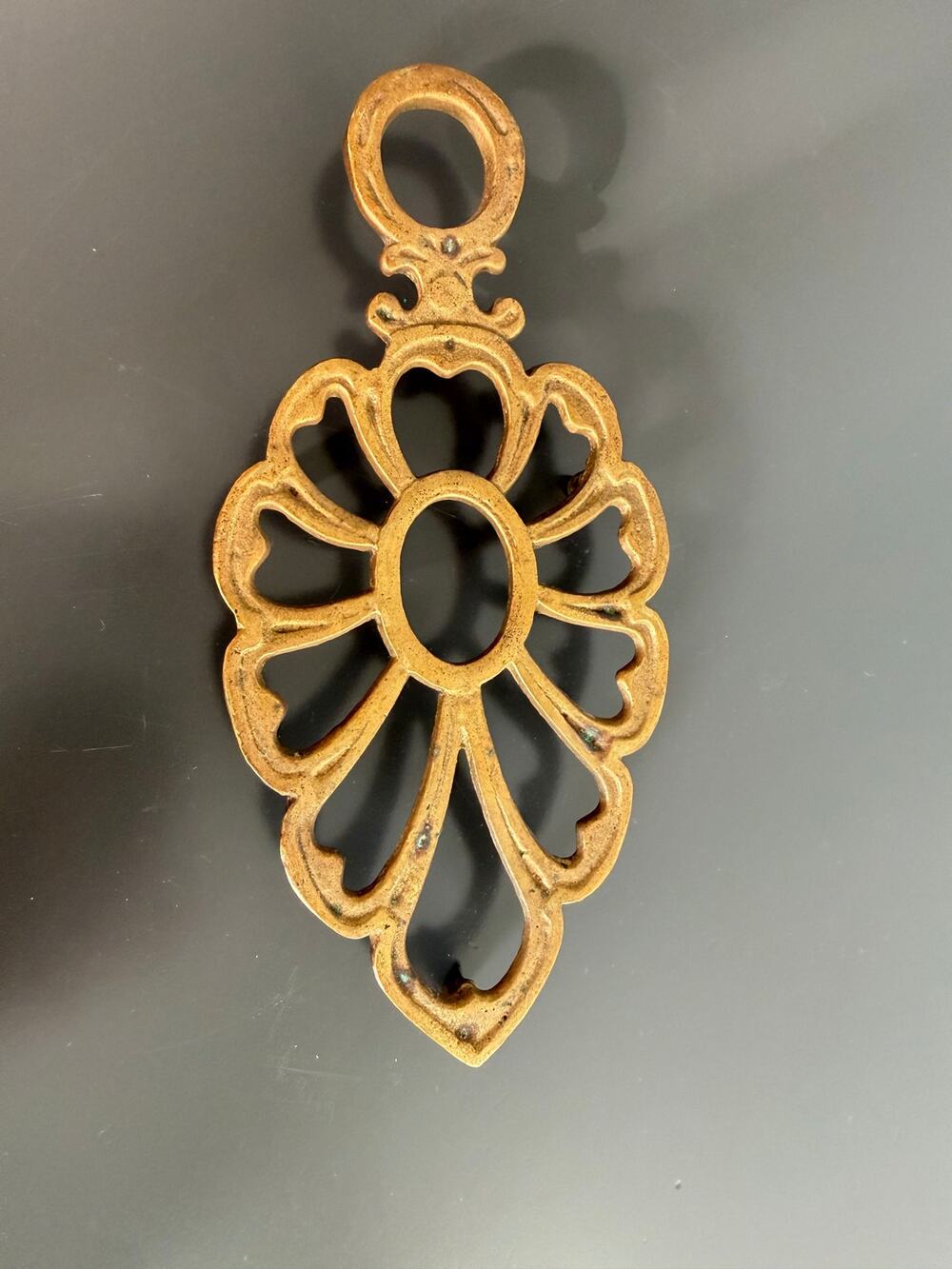 Vintage solid brass floral or leaf-shaped reticulated trivet